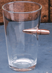 2 MONKEY BULLET PINT GLASS WITH A .50 CAL BULLET